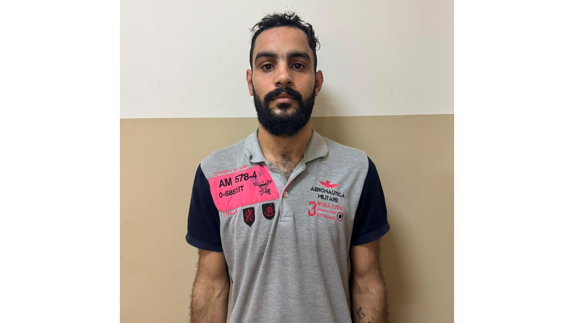 Official ISF photograph circulated in connection with a counterfeit-gold fraud investigation